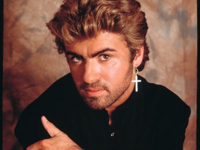 George Michael, studio portrait, London, 1987. (Photo by Michael Putland/Getty Images)